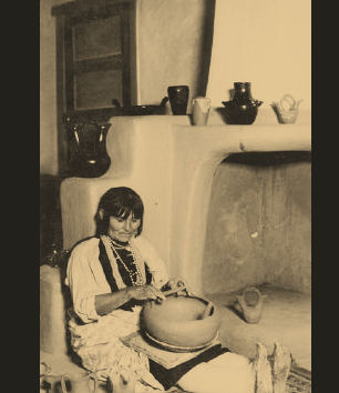 Navajo woman with her handmade pottery